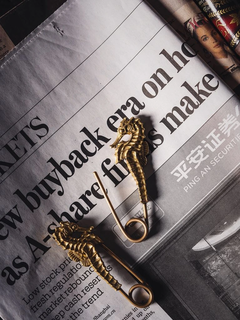 A handcrafted ring resting on linen in the Lyon atelier